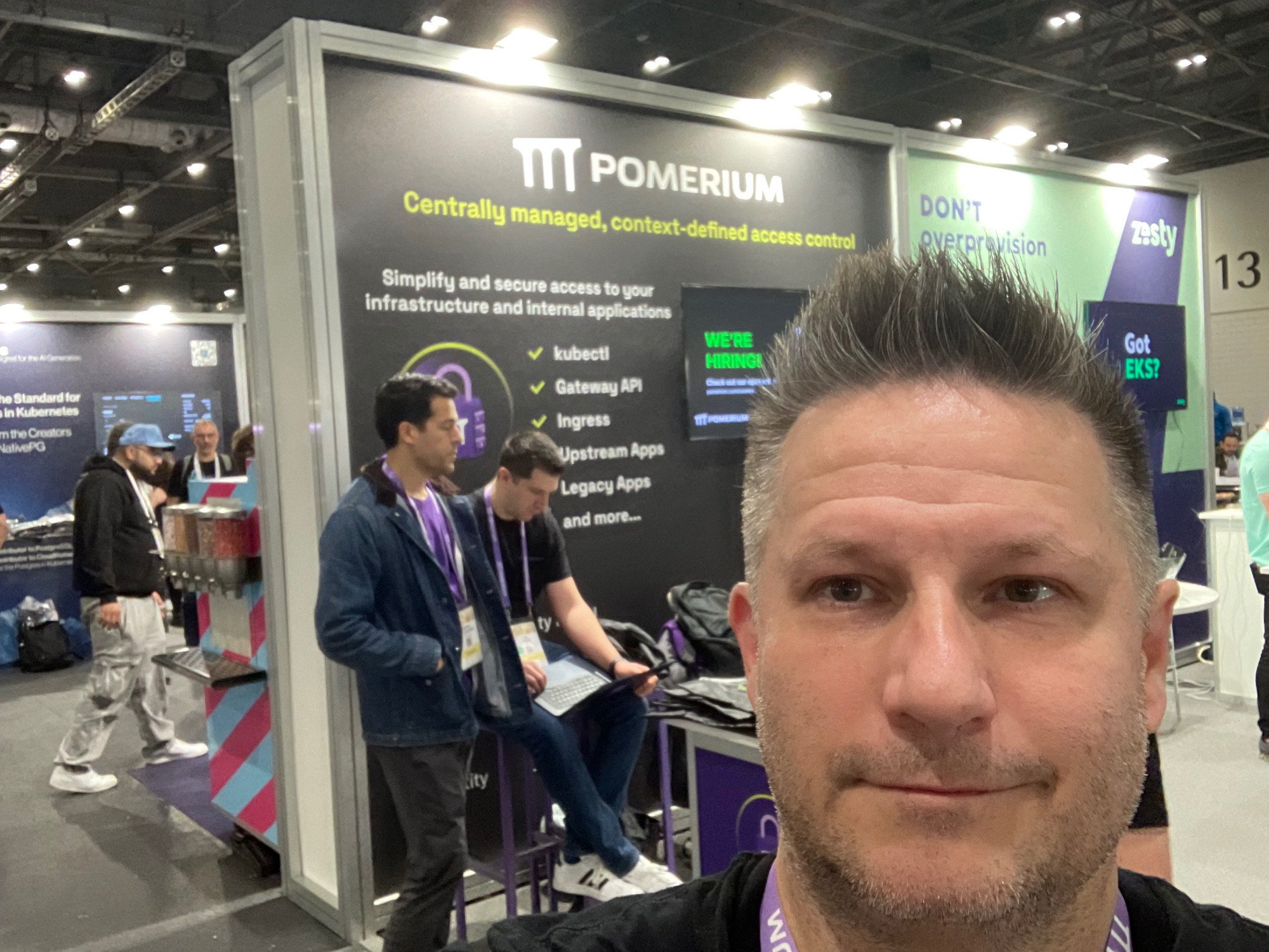 Me, RJ and Nikhil manning the Pomerium booth at KubeCon @U 2025
